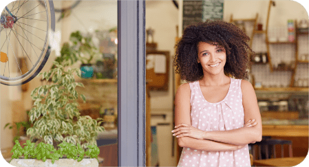 coffee shop owner standing in doorway